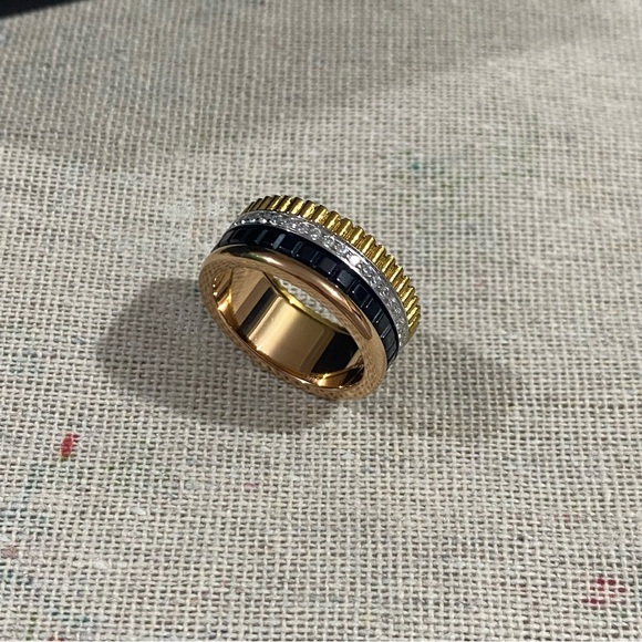 Boucheron Jewelry - Boucheron Gold-Tone Multi-Texture Ring with Black Inlay